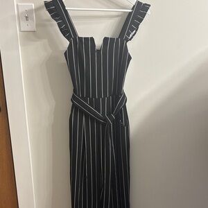Elegant Black and White Striped Jumpsuit